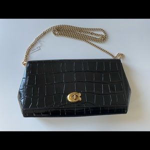 Coach Alexa Embossed Croc Clutch in black